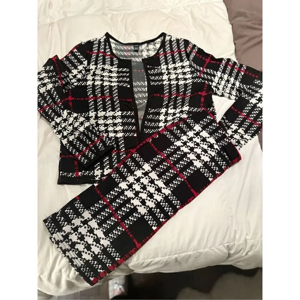 Two piece plaid open front jacket, casual contrast, trim. Pull on skirt with str